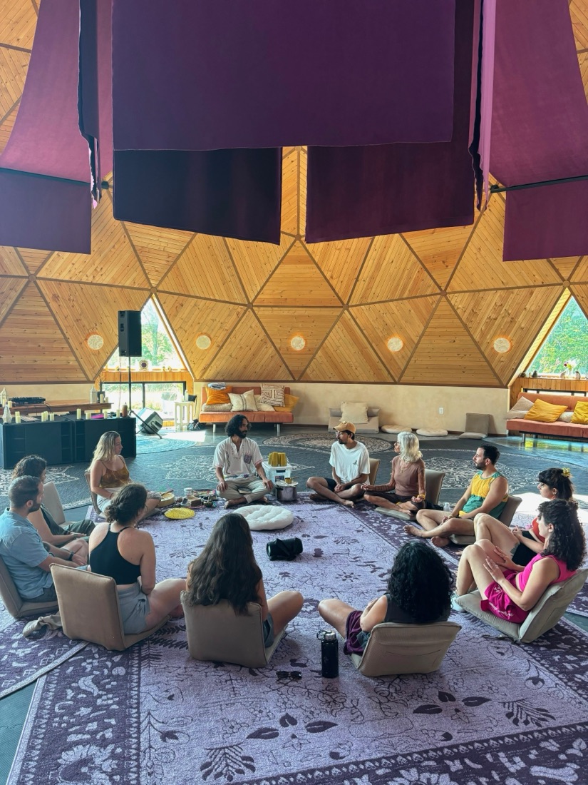 Ceremony circle gathered in a geodesic dome